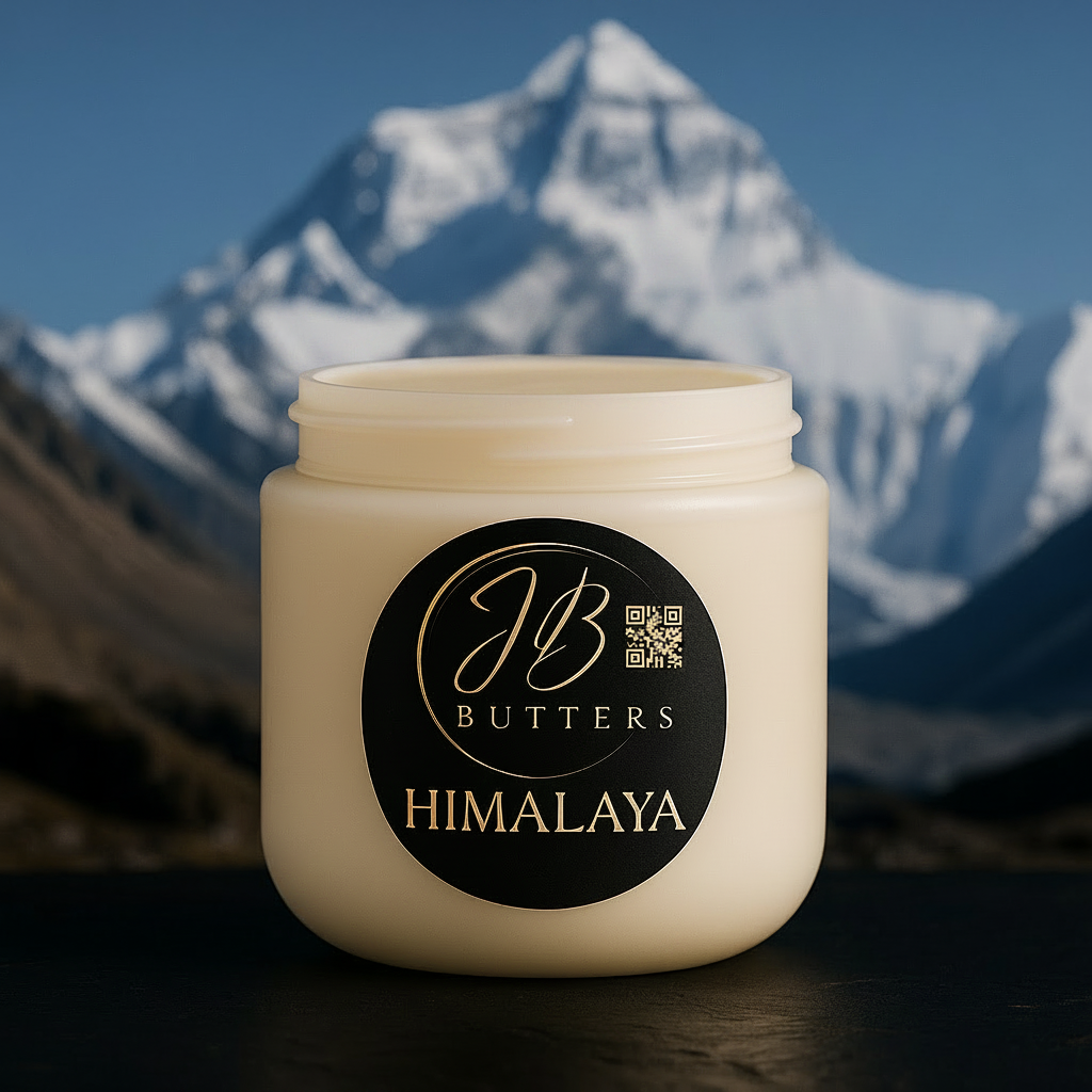 Jar of JB Butters Himalaya cream with a mountainous background