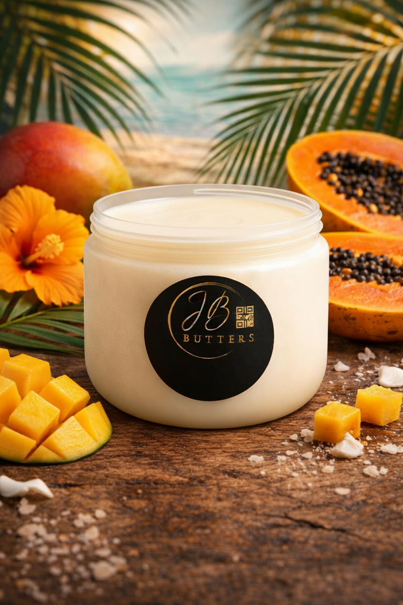 Jar of JB Butters on a wooden surface with tropical fruits and flowers