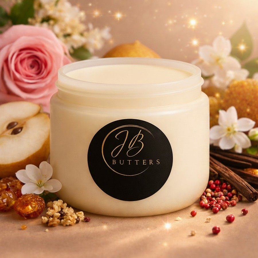 Jar of JB Butters cream with floral and fruit decorations on a soft background
