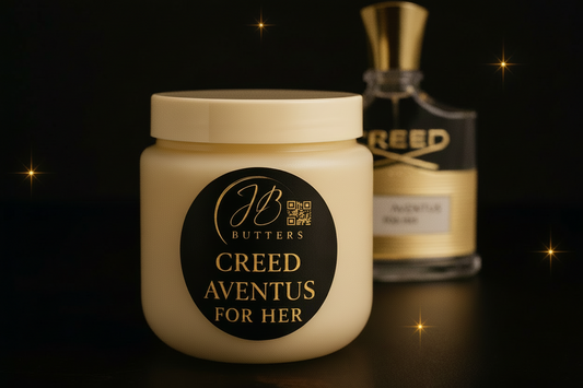 Jar of 'Creed Aventus for Her' by Butters with a bottle in the background on a dark background