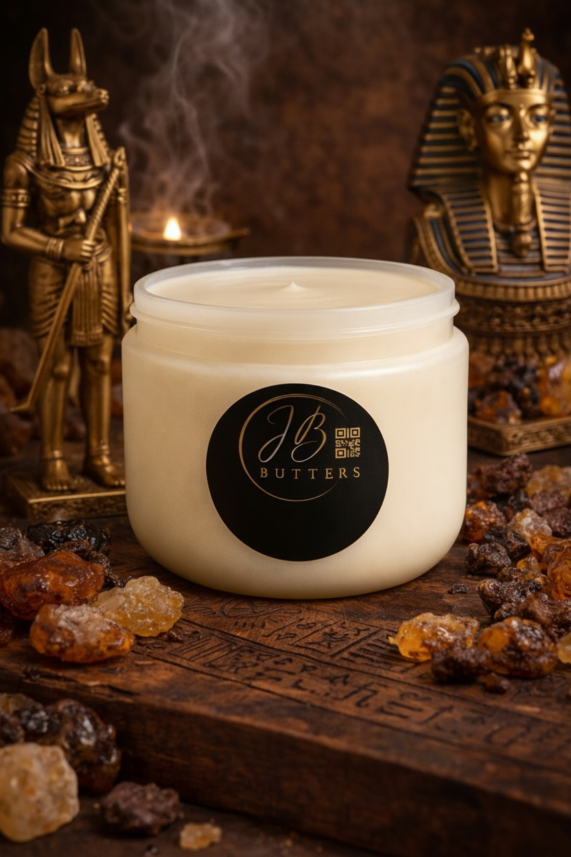 Jar of cream with 'JB Butters' logo on a rustic background with Egyptian-themed decorations.
