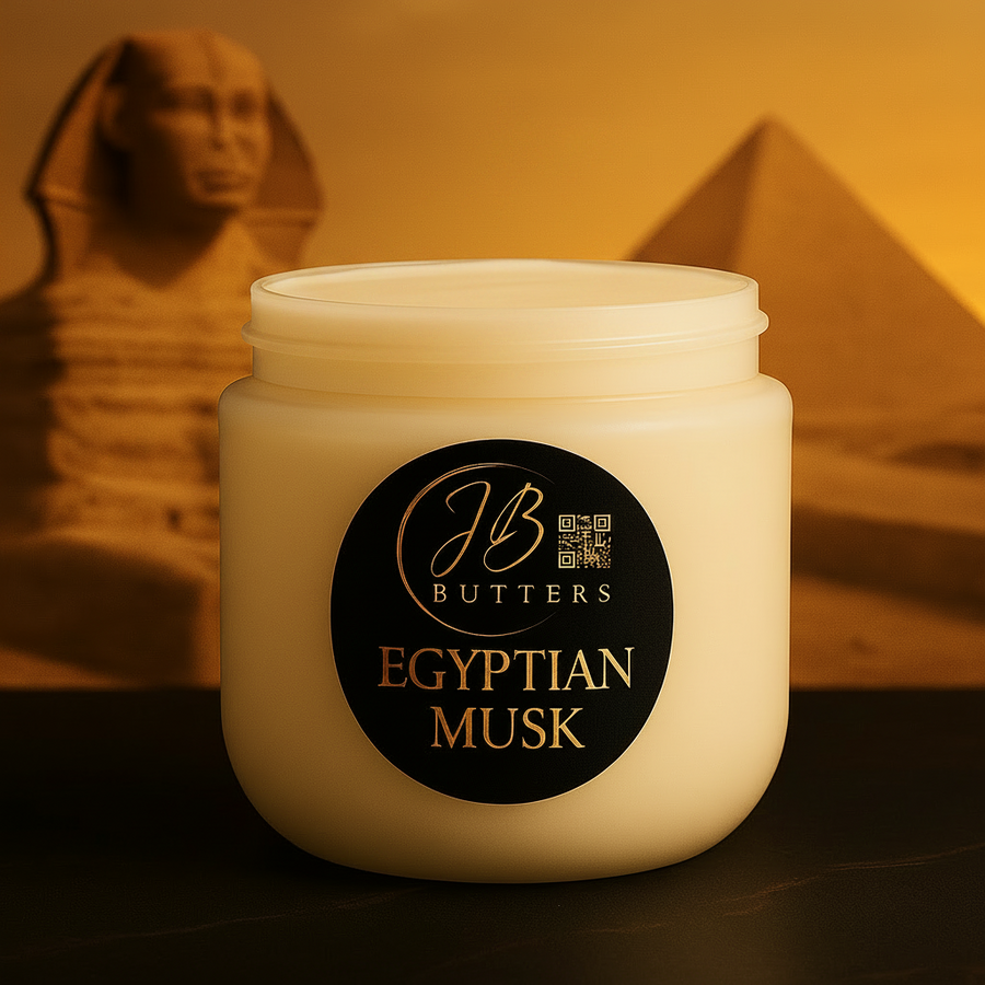 Jar of JB Butters Egyptian Musk body butter with a sphinx and pyramid in the background