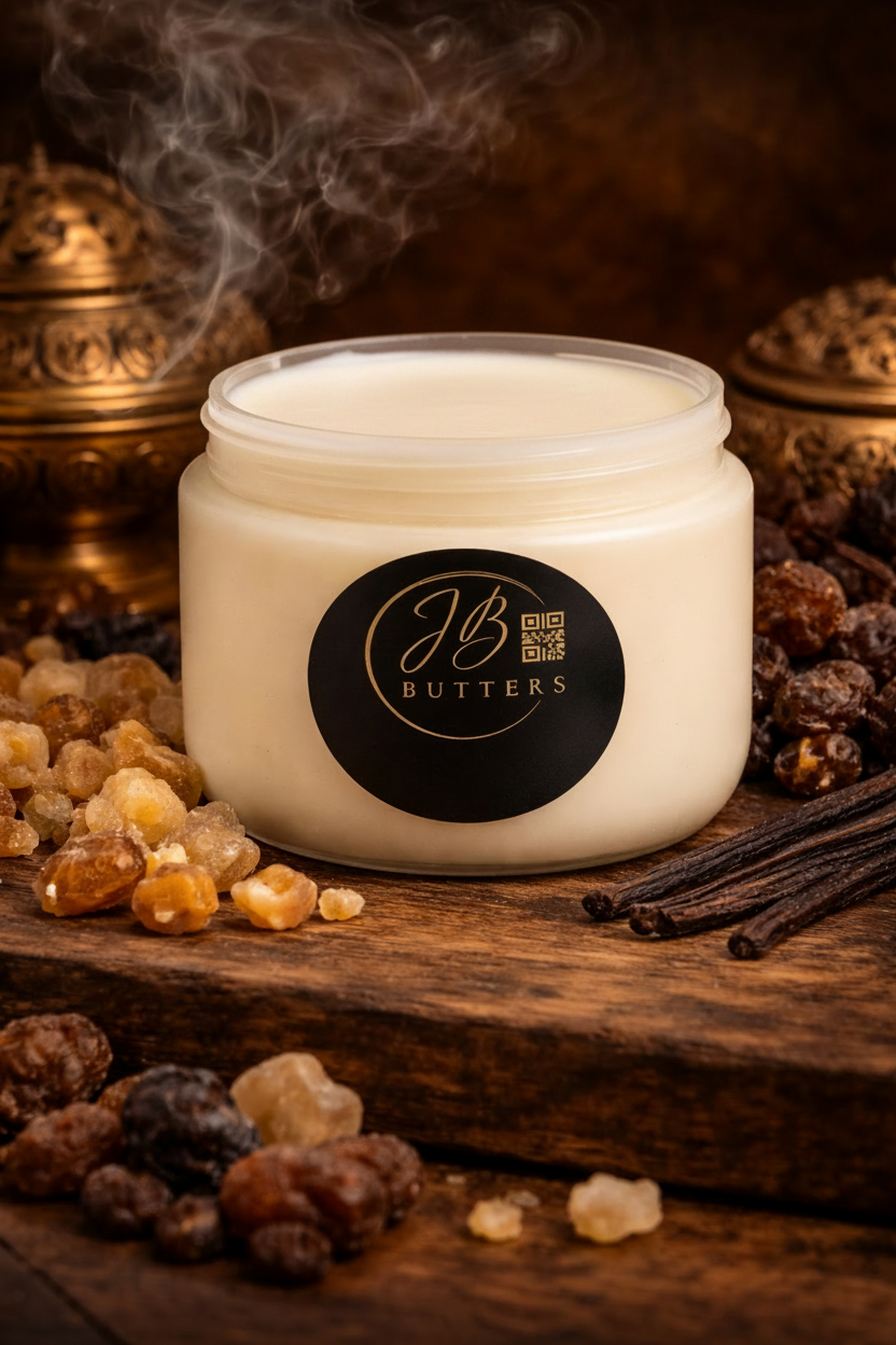 Jar of JB Butters cream on a wooden surface with spices and a dark background