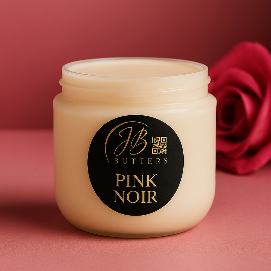 Jar of JB Butters Pink Noir cream with a rose in the background