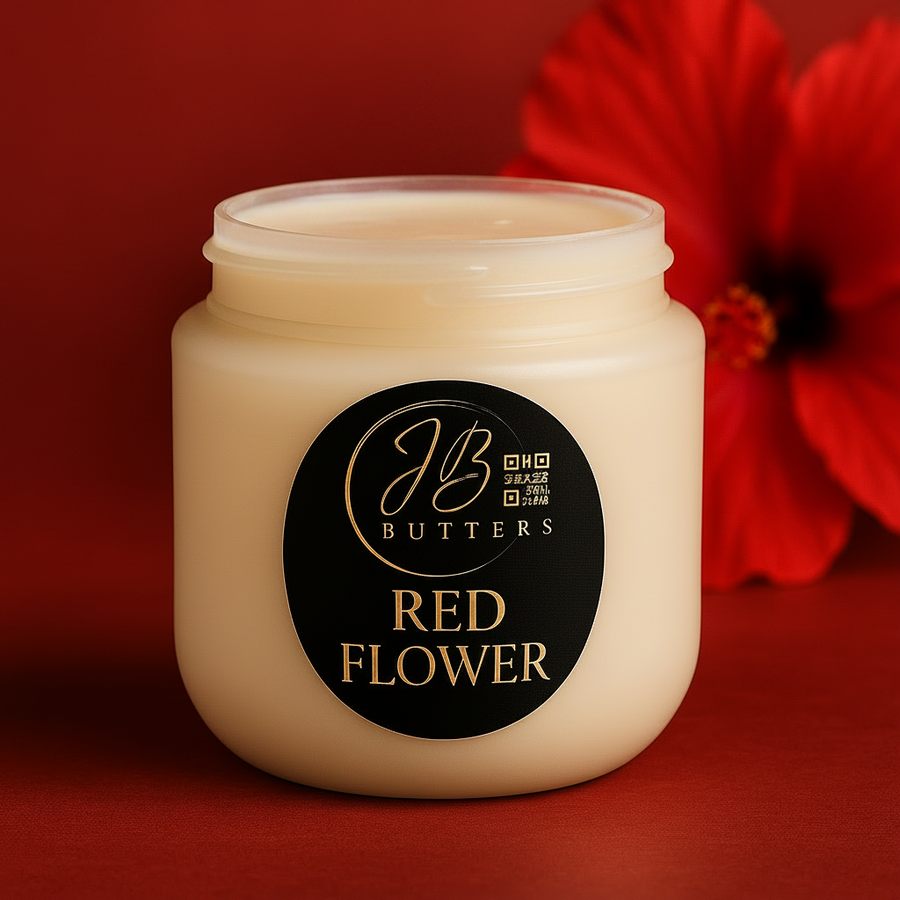 Jar of JB Butters Red Flower cream with a red flower in the background